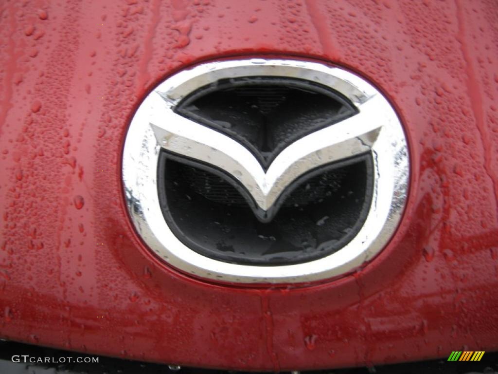 2011 Mazda MAZDA3 i Touring 4 Door Marks and Logos Photo #39208598