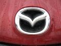2011 Mazda MAZDA3 i Touring 4 Door Badge and Logo Photo
