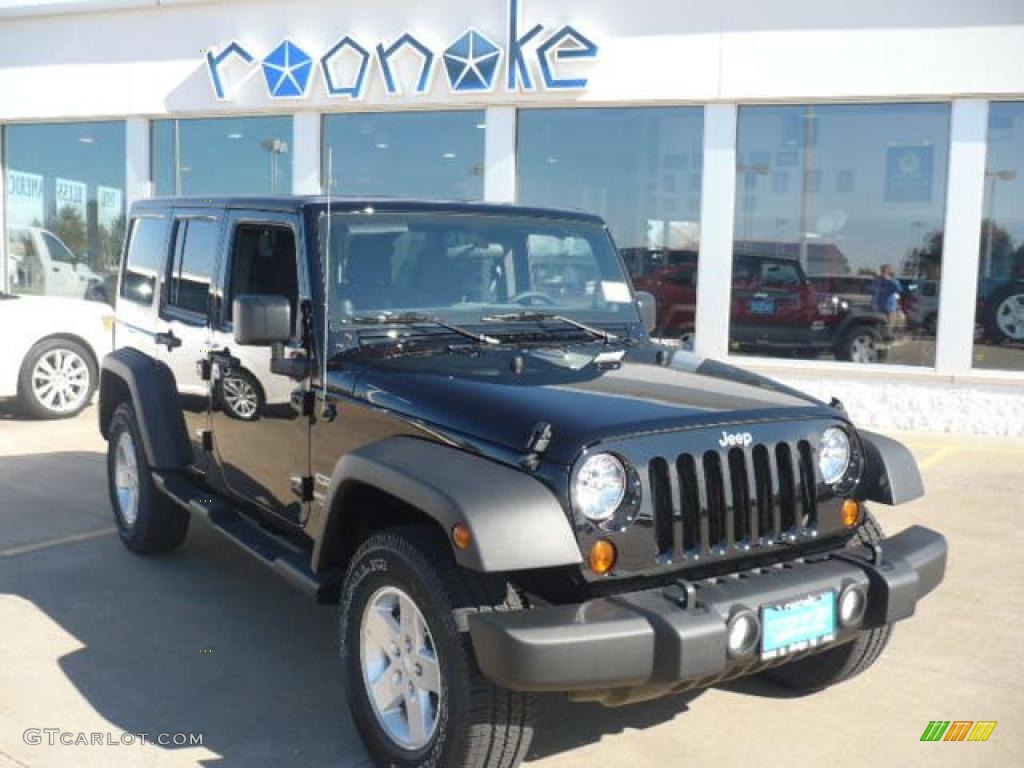 Black 2011 Jeep Wrangler Unlimited Sport 4x4 Exterior Photo #39210922