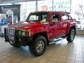 2006 Victory Red Hummer H3   photo #1