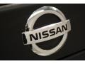 2007 Nissan Frontier SE King Cab 4x4 Badge and Logo Photo