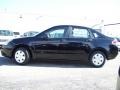 2011 Ebony Black Ford Focus S Sedan  photo #2