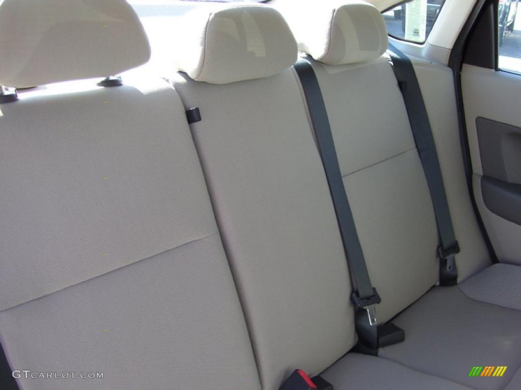 2011 Ford Focus S Sedan Medium Stone Door Panel Photo #39286095