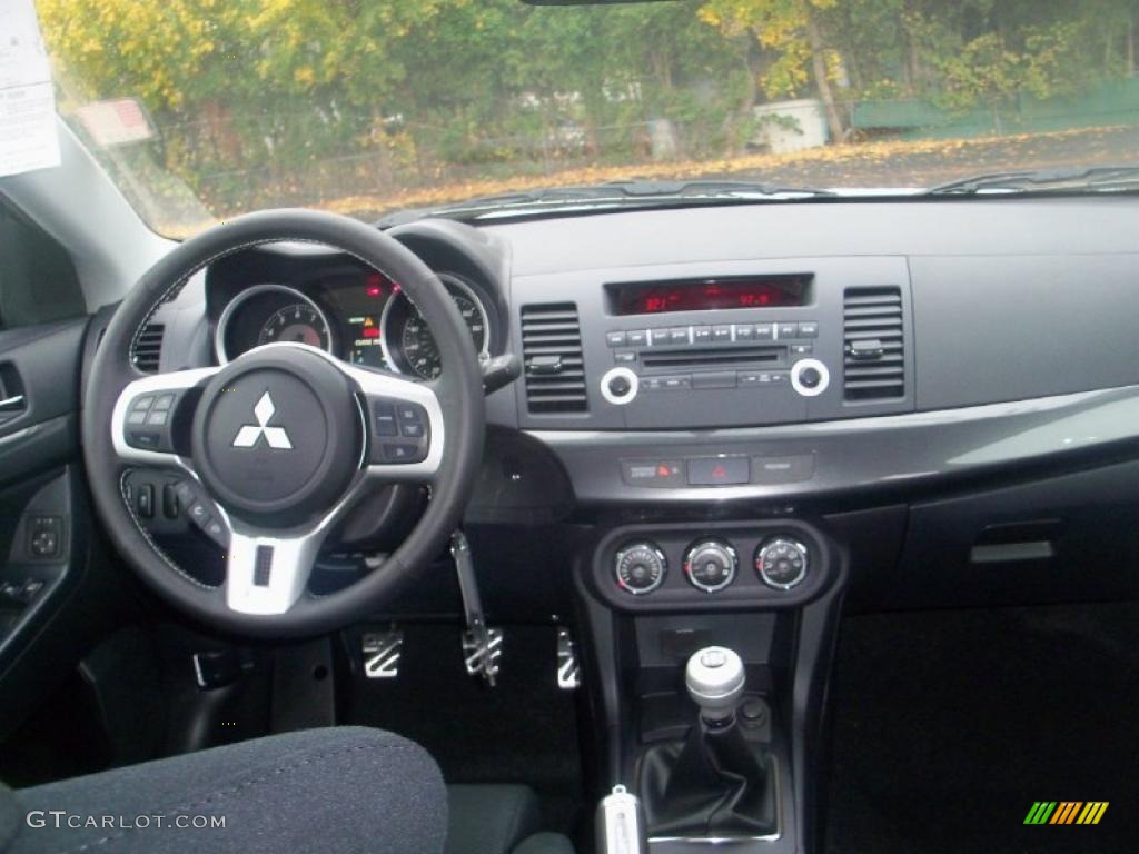 2011 Mitsubishi Lancer Evolution GSR Black Dashboard Photo #39304729