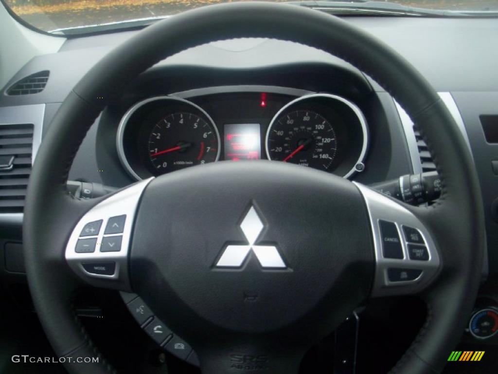 2011 Mitsubishi Outlander ES Black Steering Wheel Photo #39304833