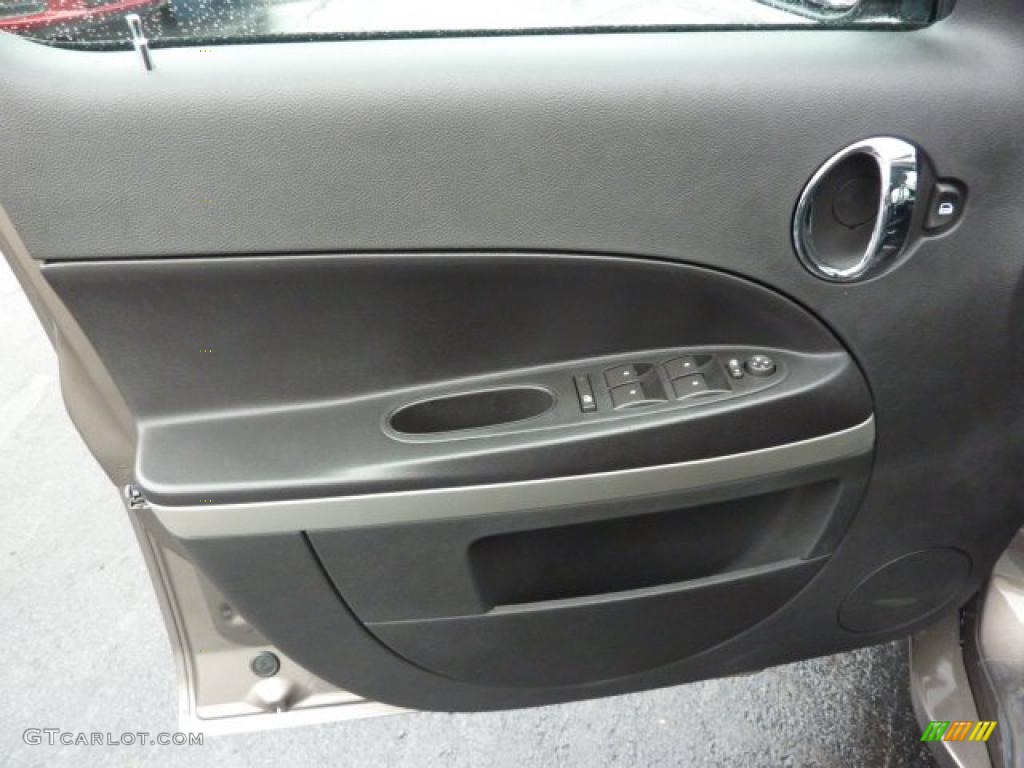 2011 Chevrolet HHR LS Ebony Door Panel Photo #39306769