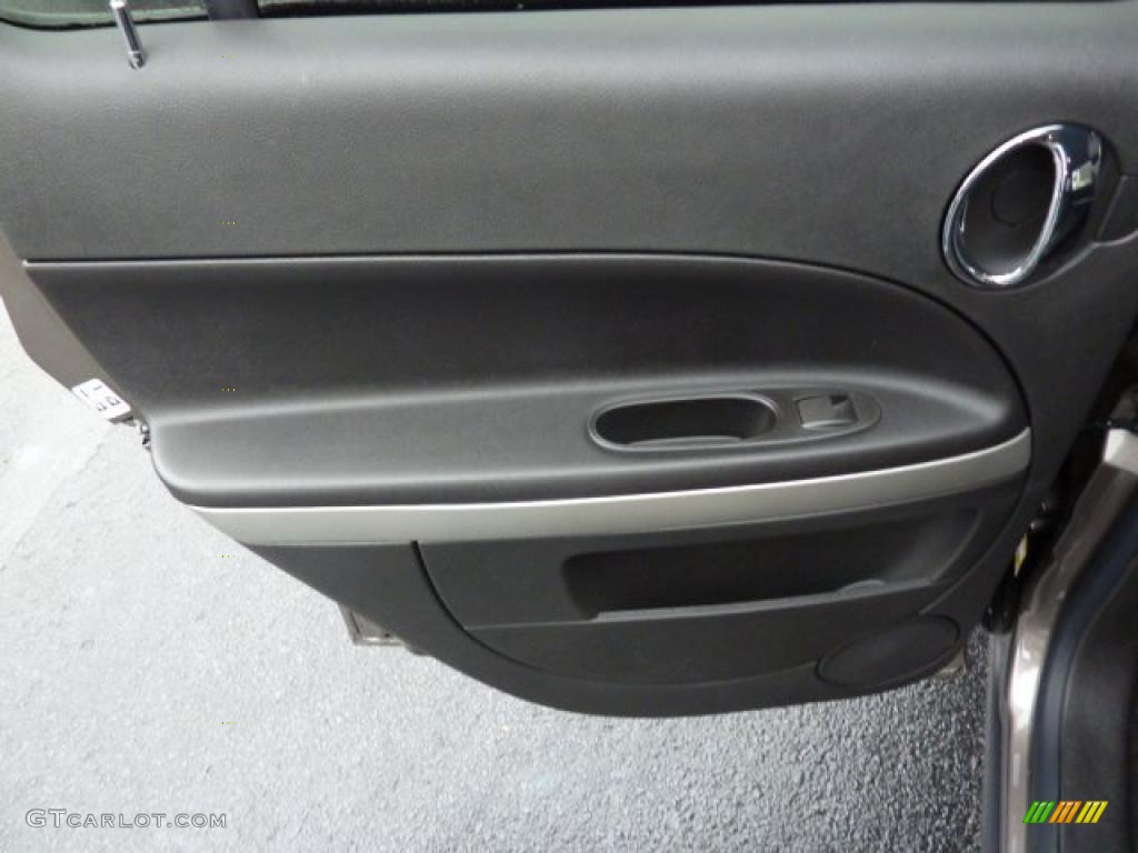 2011 Chevrolet HHR LS Ebony Door Panel Photo #39306801