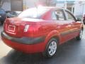 Tropical Red - Rio LX Sedan Photo No. 2