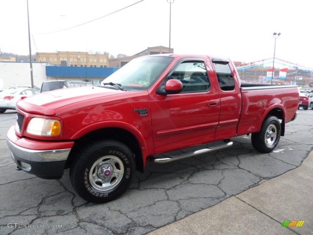 2001 F150 XLT SuperCab 4x4 - Bright Red / Medium Graphite photo #5