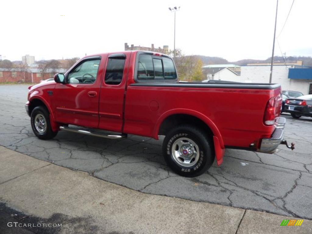 2001 F150 XLT SuperCab 4x4 - Bright Red / Medium Graphite photo #7