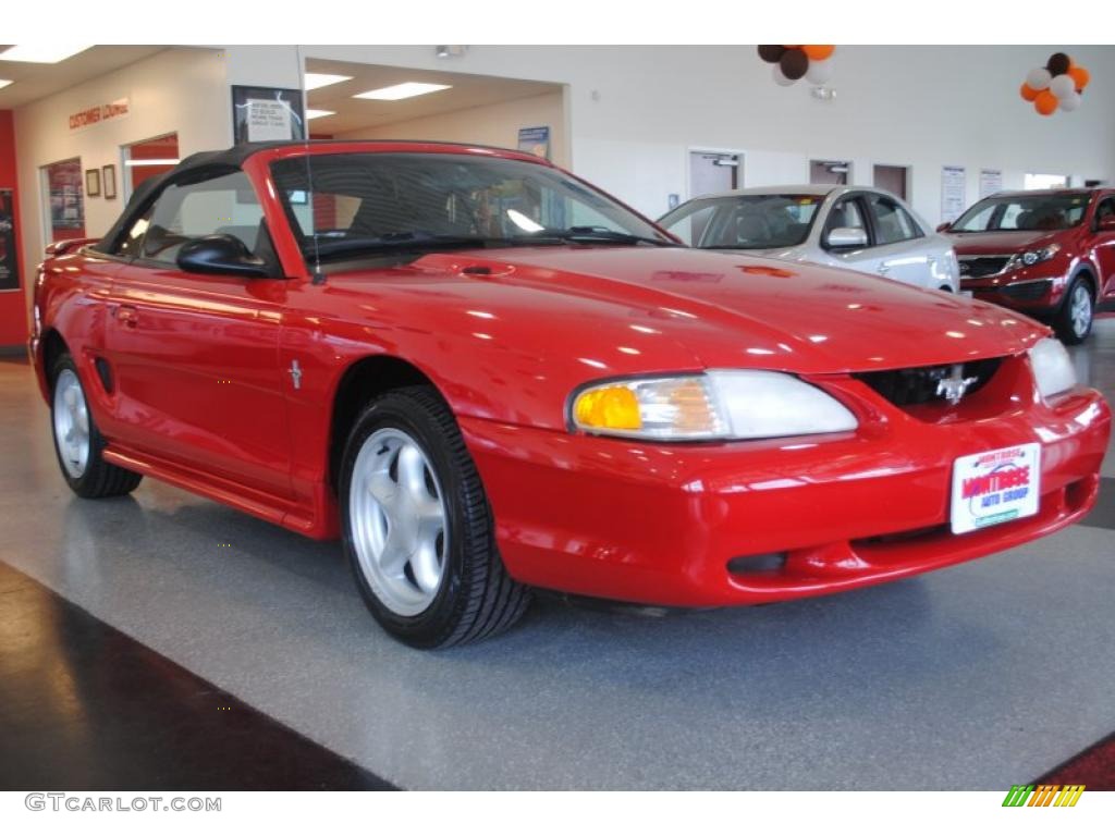 Rio Red 1997 Ford Mustang V6 Convertible Exterior Photo #39349276