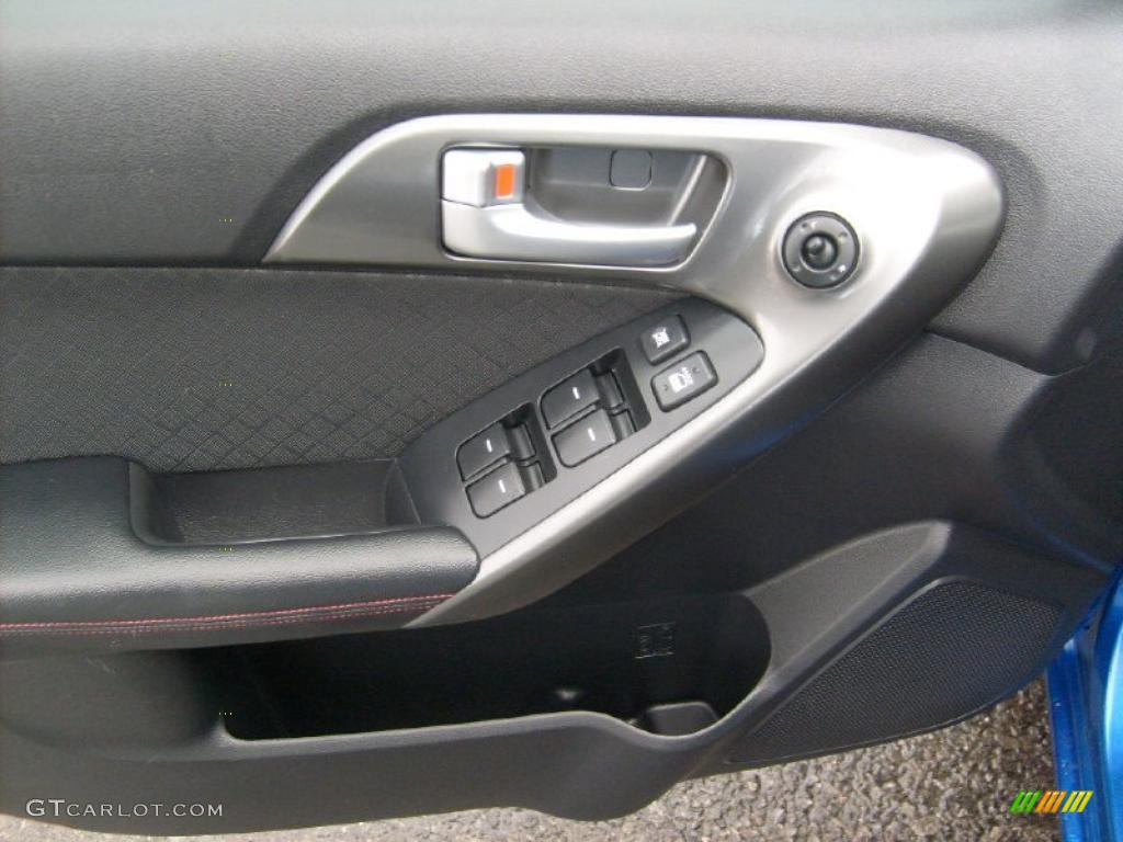 2010 Kia Forte SX Black Sport Door Panel Photo #39357440