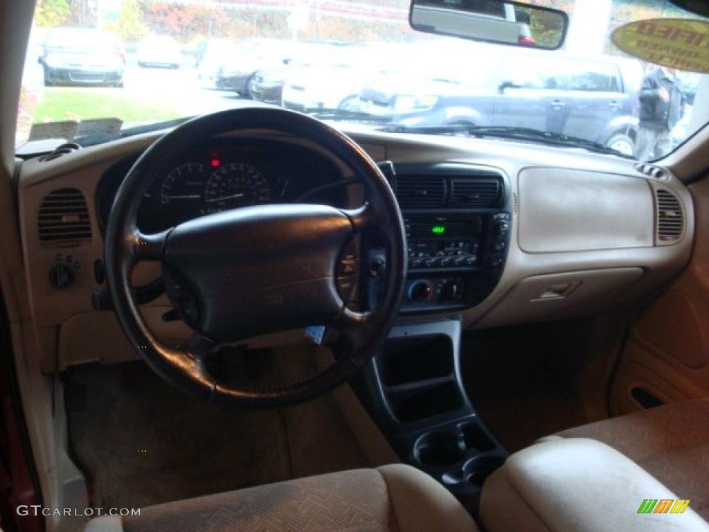 1999 Explorer XLT 4x4 - Toreador Red Metallic / Medium Prairie Tan photo #10