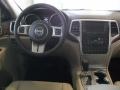 Black/Light Frost Beige Dashboard Photo for 2011 Jeep Grand Cherokee #39360440