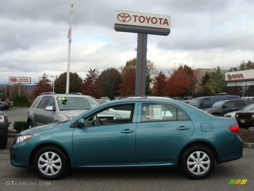 Capri Sea Green Metallic 2009 Toyota Corolla LE Exterior Photo #39392381