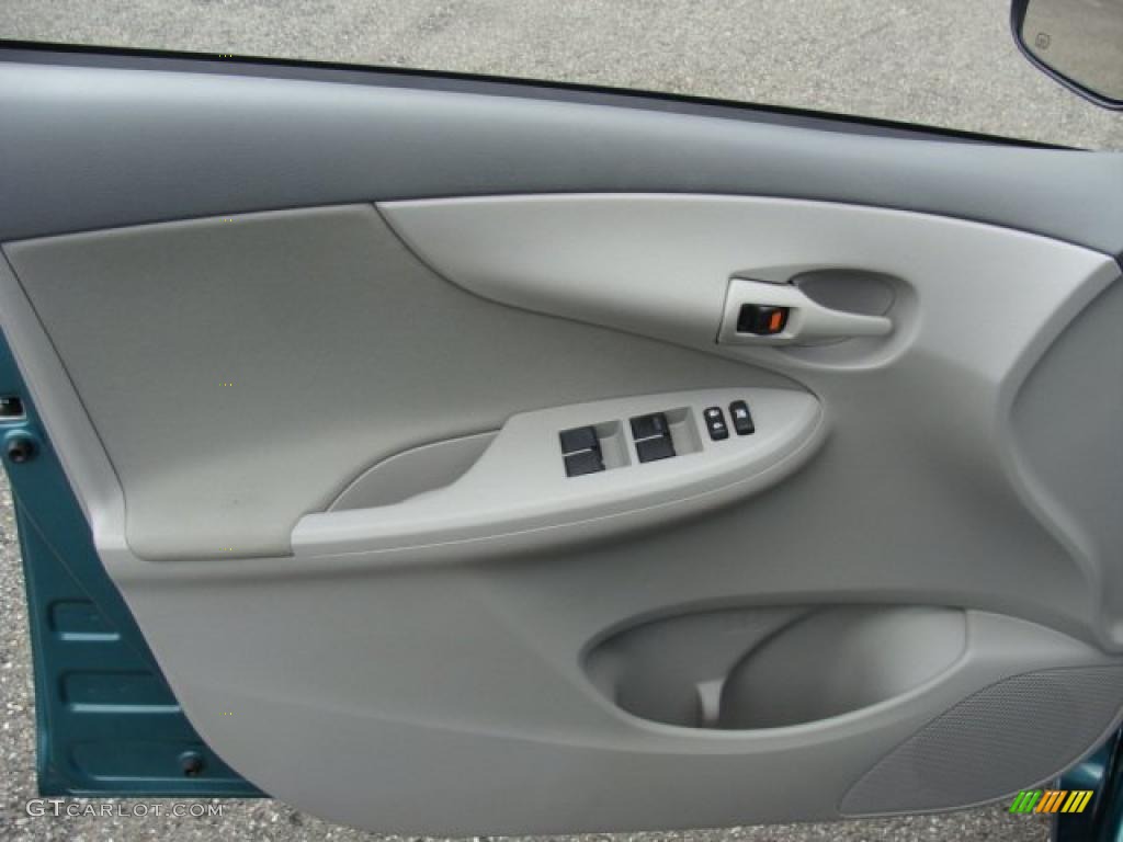 2009 Toyota Corolla LE Bisque Door Panel Photo #39392453