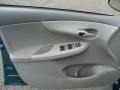 Bisque 2009 Toyota Corolla LE Door Panel