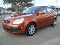 Sunset Orange 2009 Kia Rio LX Sedan Exterior