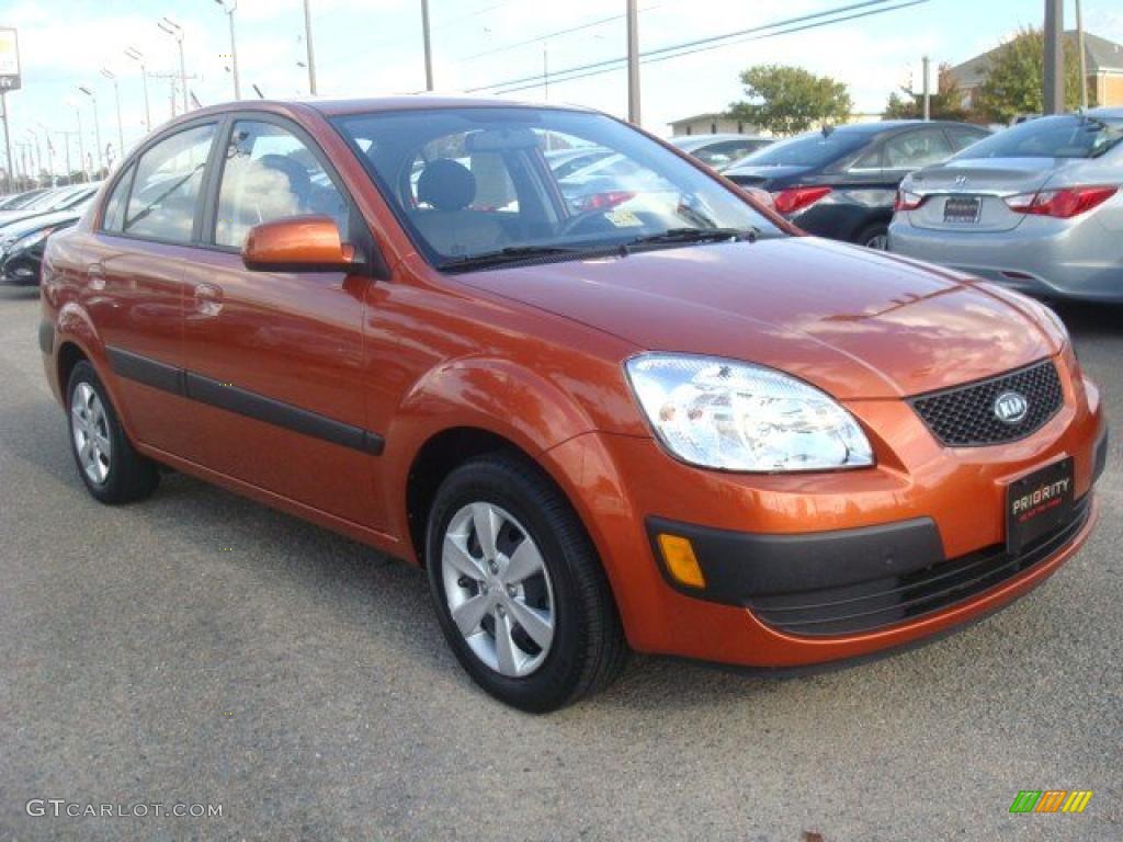 Sunset Orange 2009 Kia Rio LX Sedan Exterior Photo #39412661