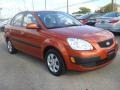 Sunset Orange 2009 Kia Rio LX Sedan Exterior