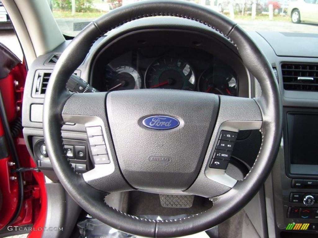 2010 Fusion Sport - Sangria Red Metallic / Charcoal Black/Sport Blue photo #17