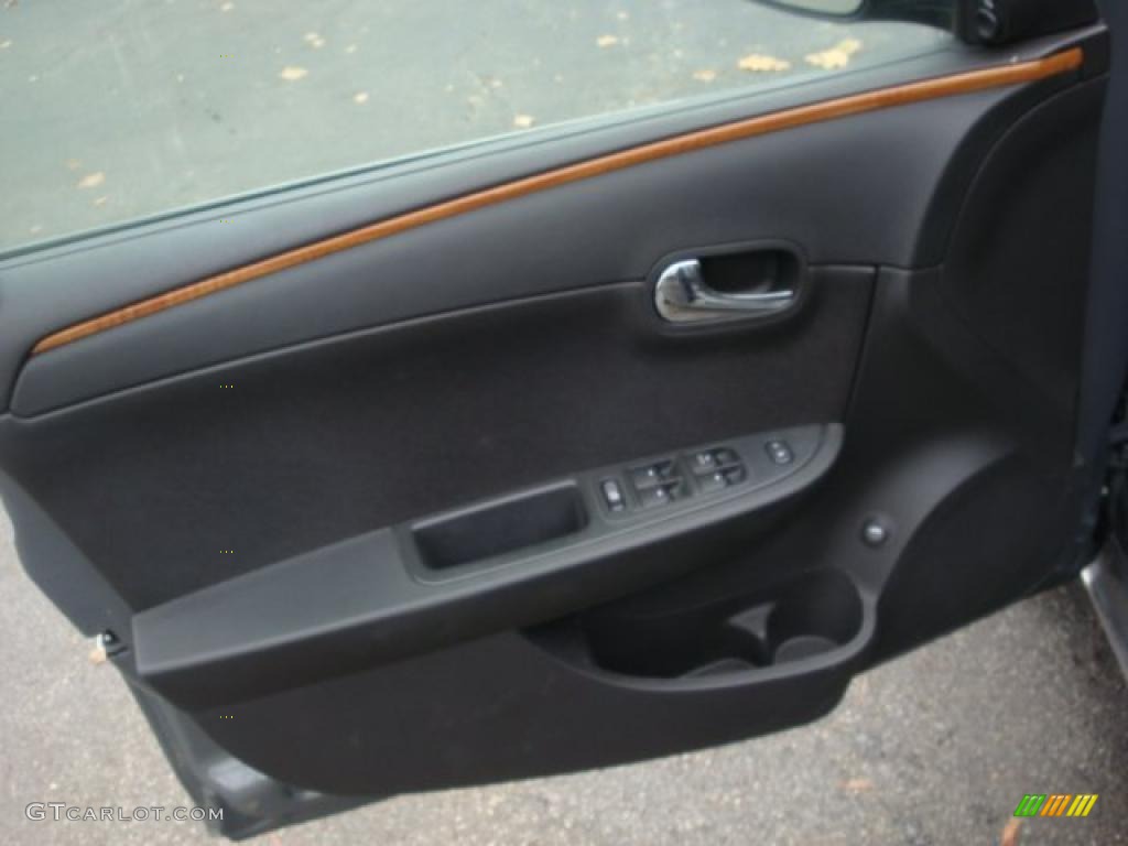2008 Chevrolet Malibu LT Sedan Ebony Door Panel Photo #39427598