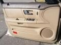 Medium Parchment 2001 Ford Taurus SEL Door Panel