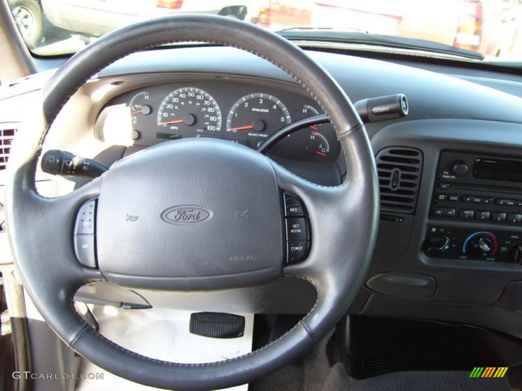 2002 Ford F150 XLT SuperCab Medium Graphite Steering Wheel Photo #39465786