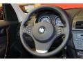2010 BMW X3 Black Interior Steering Wheel Photo