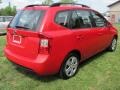 2010 Molten Red Kia Rondo LX  photo #2