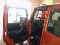 2011 Mango Tango Pearl Jeep Wrangler Unlimited Sport 4x4  photo #16