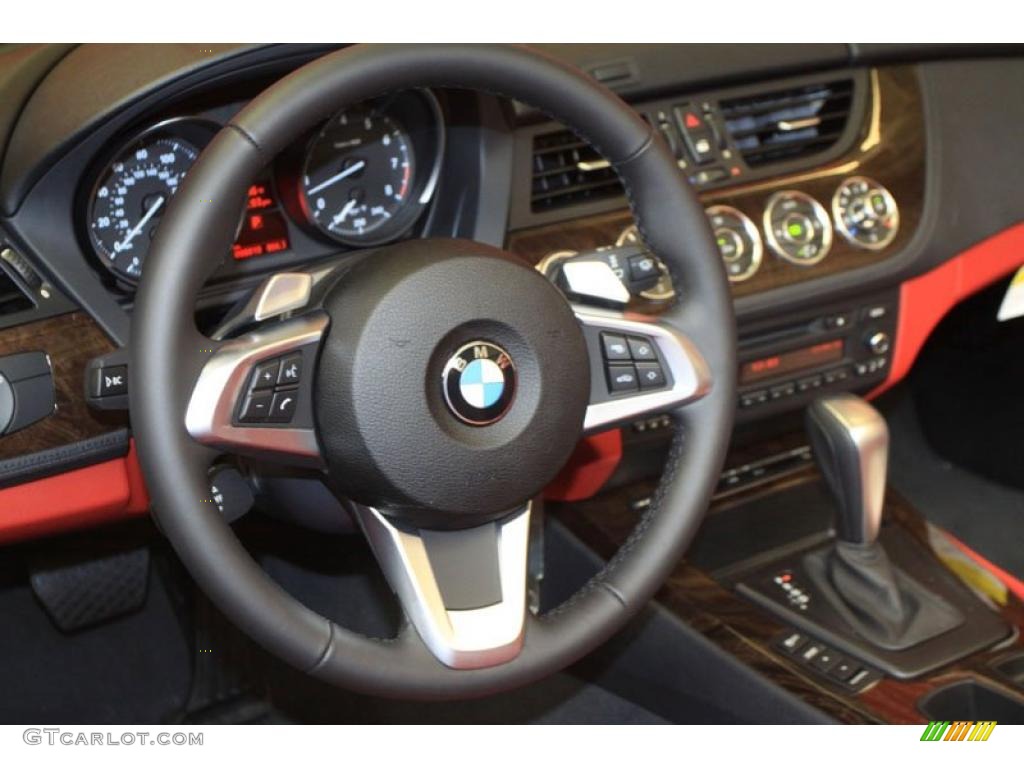 2011 BMW Z4 sDrive30i Roadster Coral Red Steering Wheel Photo #39484633
