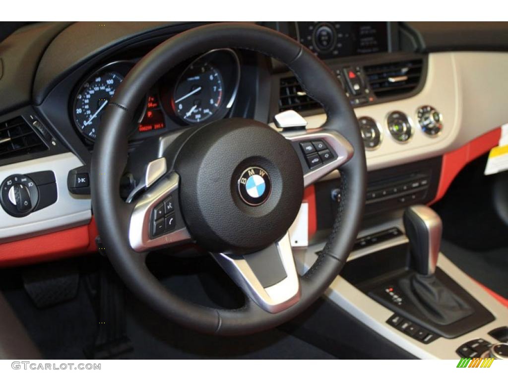 2011 BMW Z4 sDrive30i Roadster Coral Red Steering Wheel Photo #39485221