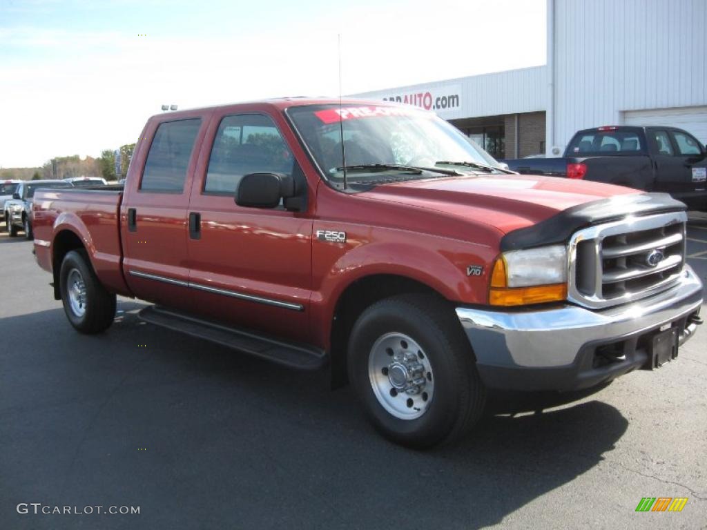 2000 F250 Super Duty XL Crew Cab - Bright Amber Metallic / Medium Graphite photo #1