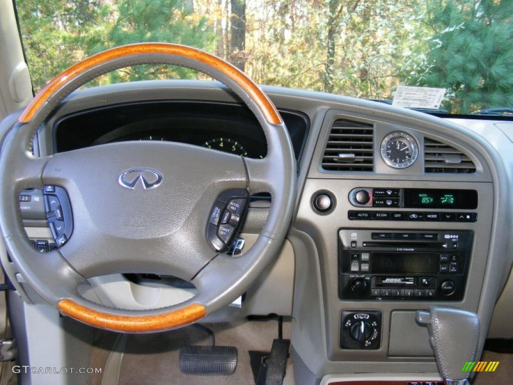 2002 Infiniti QX4 4x4 Stone Beige Dashboard Photo #39515332