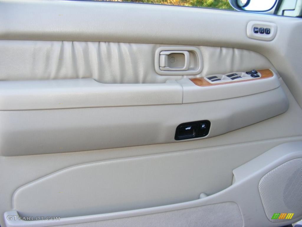 2002 Infiniti QX4 4x4 Stone Beige Door Panel Photo #39515688