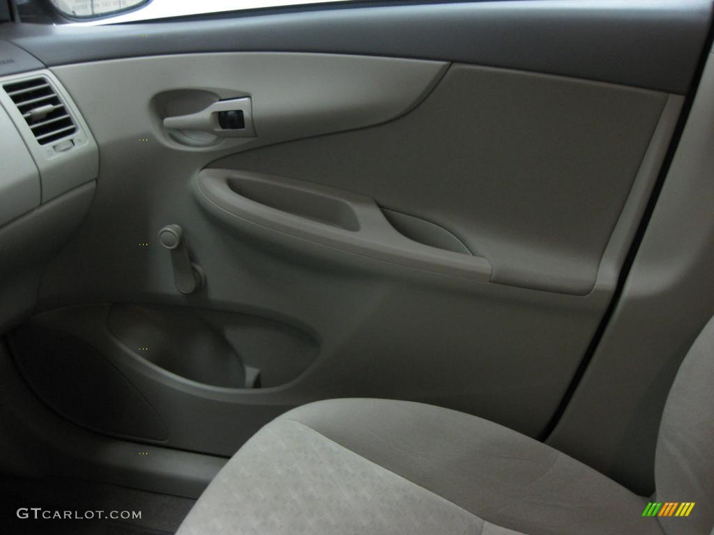 2010 Toyota Corolla Standard Corolla Model Ash Door Panel Photo #39521849