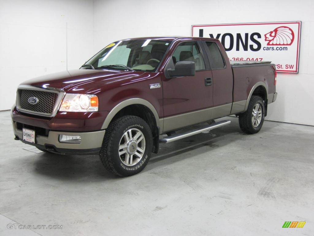 2005 F150 Lariat SuperCab 4x4 - Dark Toreador Red Metallic / Tan photo #23