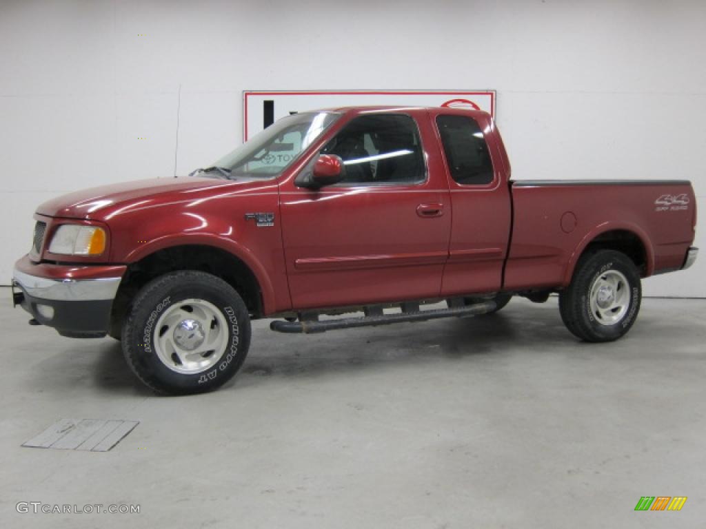 2000 F150 XLT Extended Cab 4x4 - Toreador Red Metallic / Medium Graphite photo #1