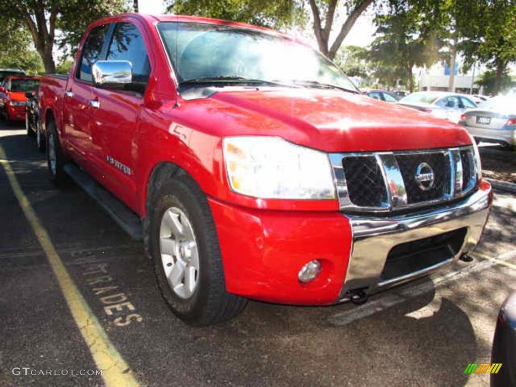 2005 Titan LE Crew Cab - Red Alert / Graphite/Titanium photo #1