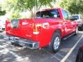 2005 Red Alert Nissan Titan LE Crew Cab  photo #2