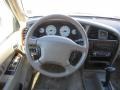 Beige 2001 Nissan Pathfinder LE Steering Wheel