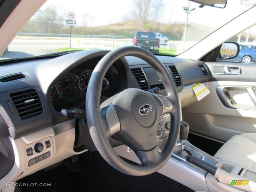 2009 Subaru Legacy 2.5i Sedan Off Black Steering Wheel Photo #39595939