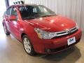 2009 Sangria Red Metallic Ford Focus SES Sedan  photo #1
