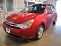 2009 Sangria Red Metallic Ford Focus SES Sedan  photo #2