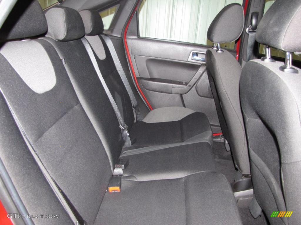 2009 Focus SES Sedan - Sangria Red Metallic / Charcoal Black photo #8