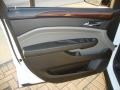 Ebony/Titanium Door Panel Photo for 2011 Cadillac SRX #39665453