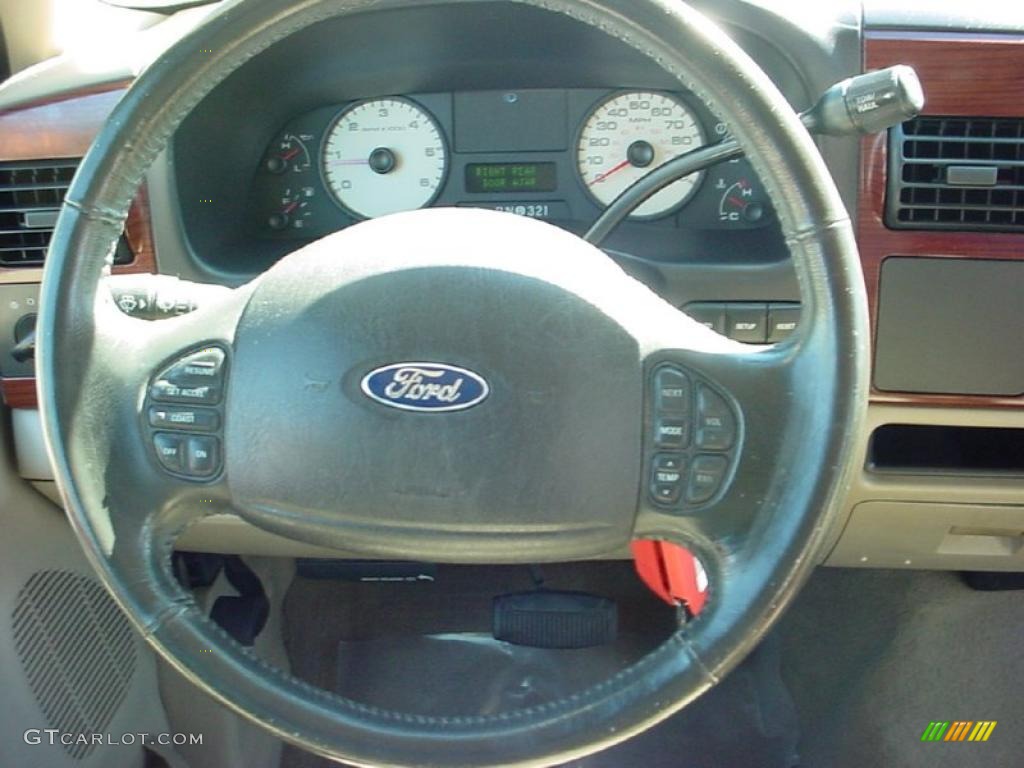 2005 Ford F250 Super Duty Lariat Crew Cab Tan Steering Wheel Photo #39669807
