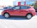 2011 Cayenne Red Nissan Rogue S  photo #2