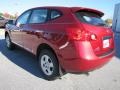 2011 Cayenne Red Nissan Rogue S  photo #3
